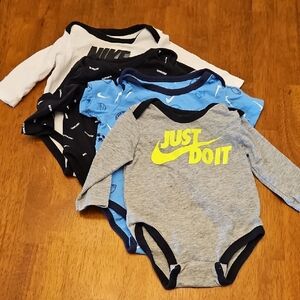 Lot Of 4 Nike Onesies